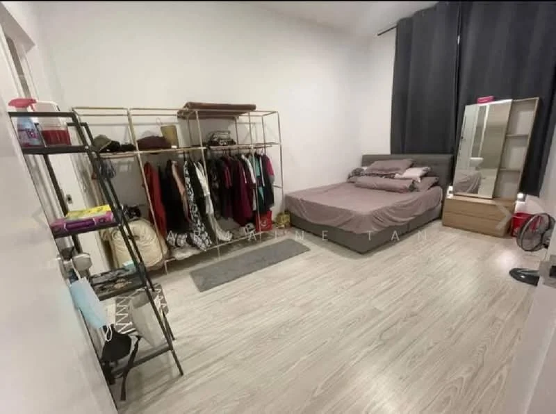 Bedroom features: queen-size bed with grey bedding, metal bed frame, open clothing rack with hanging clothes, full-length mirror, wooden shelving unit, light-colored laminate flooring, grey area rug, black curtains, wall-mounted fan; style: modern.