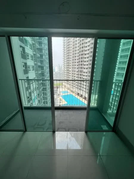 Room features: floor-to-ceiling sliding glass doors, balcony with glass railing, white walls, grey tiled flooring, city view, pool view; style: modern; view: pool.