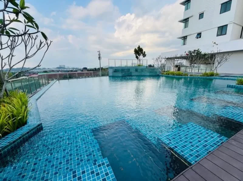 Exterior type: swimming pool deck; features: infinity pool, tiled pool deck with blue mosaic tiles, landscaped garden with tropical plants, glass railing, poolside loungers, water features, surrounding greenery, city skyline view in background; style: modern.