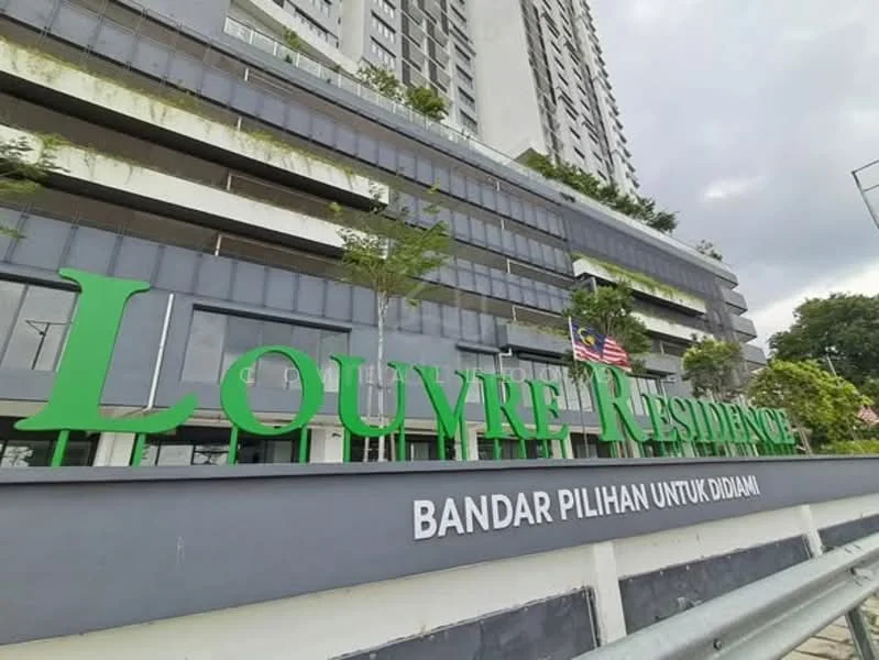 Exterior type: high-rise condominium; features: glass curtain wall, green signage with 'LOUVRE RESIDENCE', landscaped entrance, multiple storeys, balconies on upper floors, surrounding greenery, flagpole with Malaysian flag; style: modern.