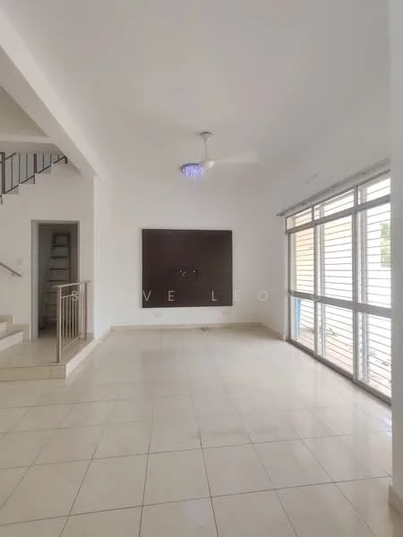 Living features: white painted walls, cream tiled flooring, 5-blade ceiling fan with light, large floor-to-ceiling windows, sliding glass door, feature wall with mounted TV, staircase visible in background, natural light from windows; style: modern.