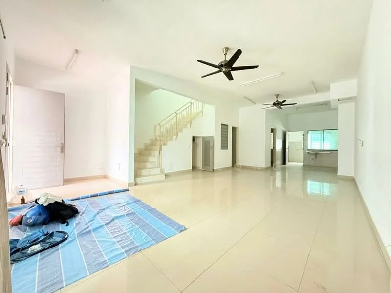 Living features: white painted walls, glossy beige tile flooring, 5-blade ceiling fan, large windows with natural light, open layout, staircase leading to upper floor, air conditioning unit, space for furniture arrangement; style: modern. Kitchen features: open kitchen layout, light-colored cabinetry, countertop space, window for natural light; style: modern.