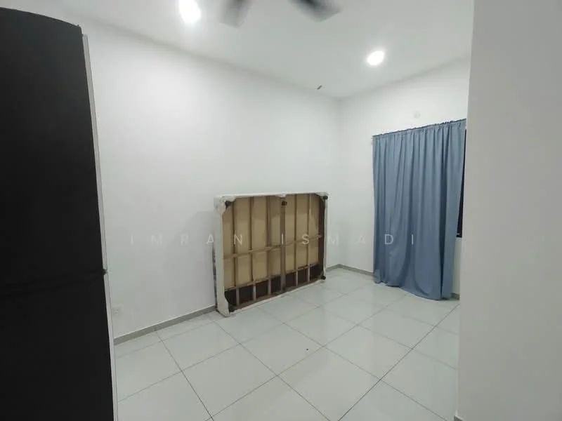 Room features: white painted walls, grey tiled flooring, ceiling fan, blue curtain, built-in shelving unit, refrigerator, light fixture.