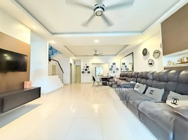 Living features: grey leather sectional sofa, coffee table, wall-mounted TV, white painted walls, recessed downlights, ceiling fan with light, large floor tiles, decorative wall art, dining table with chairs, open layout, staircase in background; style: modern.