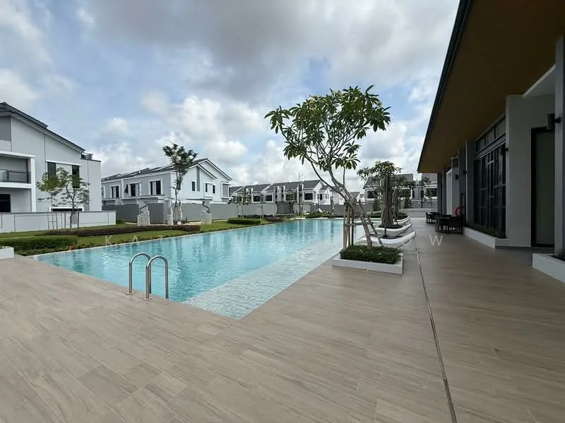 Exterior type: swimming pool deck; features: infinity pool, pool deck with loungers, landscaped garden, manicured lawn, paved walkway, surrounded by residential buildings, trees for shade, modern architecture; style: modern.