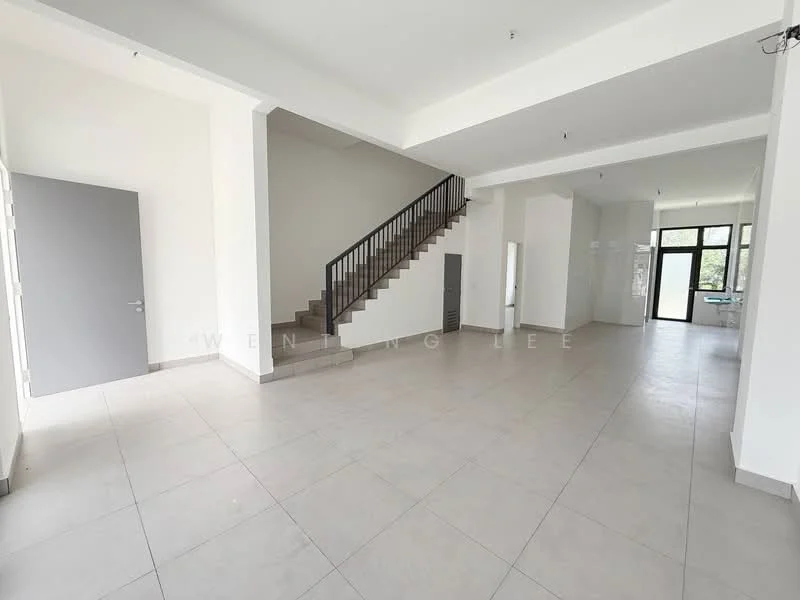 Room features: white painted walls, grey tiled flooring, staircase with wooden railing, large windows allowing natural light, open layout, high ceiling, neutral color scheme, corner space with potential for furniture placement; style: modern; view: garden.