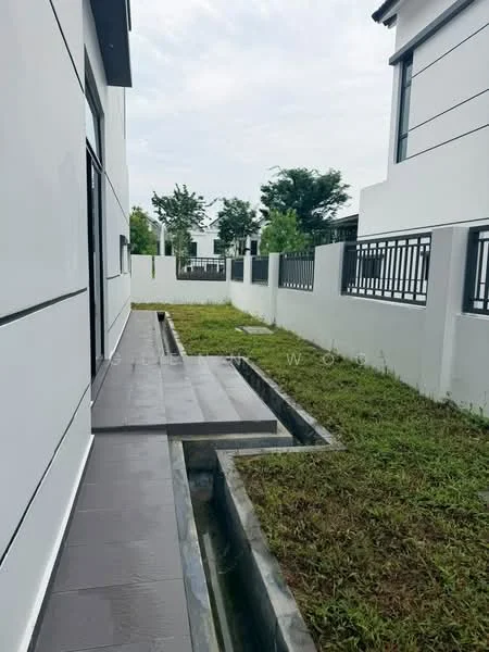 Exterior features: concrete pathway, manicured lawn, landscaped garden, fence, modern facade, grey exterior walls, paved walkway, drainage channel; style: modern.