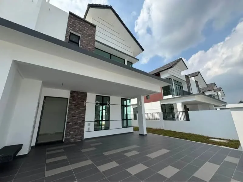 Exterior type: semi-detached house; features: white painted facade, stone cladding accents, flat roof, approximately 2-storey, manicured lawn, paved driveway, large windows, balcony on upper floor, surrounded by greenery; style: modern.