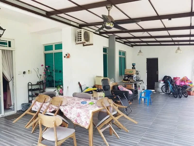 Room features: white painted walls, grey tiled flooring, exposed ceiling beams, 5-blade ceiling fan, dining table with floral tablecloth, wooden dining chairs, open shelving unit, bicycle, various storage bins, air conditioning unit, hanging pendant lights; style: modern; view: garden.
