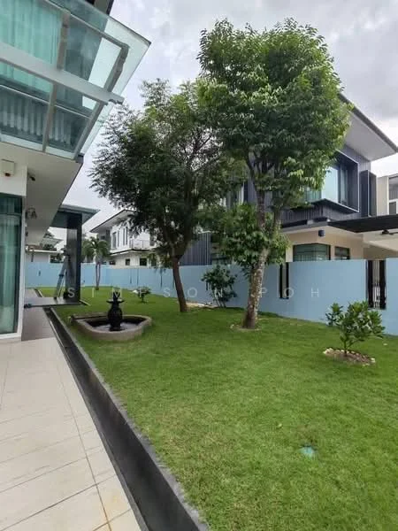 Exterior type: detached bungalow; features: manicured lawn, mature trees, stone-paved walkway, water feature with fountain, fenced perimeter, modern facade with glass elements, surrounded by greenery; style: modern.
