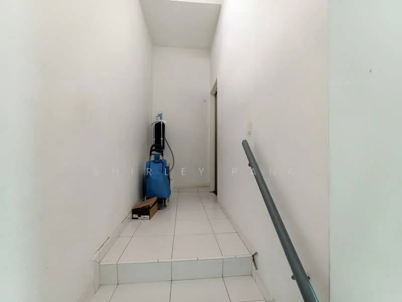 Room features: white painted walls, white tiled flooring, staircase with handrail, vacuum cleaner, blue cleaning equipment, box on the floor.
