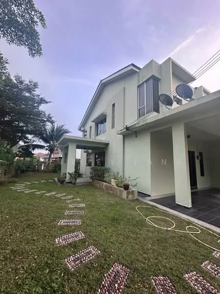 Exterior type: detached bungalow; features: green painted facade, sloping roof, multiple satellite dishes, large windows, manicured lawn, stone pathway, potted plants, surrounding greenery; style: modern.