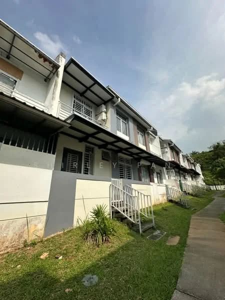 Exterior type: linked terrace house; features: two-storey building, white painted facade, grey accents, metal roof, front porch with steps, manicured lawn, sidewalk, green landscaping, windows with grills, balconies on upper floor; style: modern.