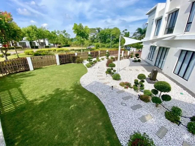Exterior type: detached bungalow; features: manicured lawn, decorative stone pathway, landscape garden with shrubs, white gravel landscaping, fenced yard, outdoor flag, paved walkway, trees in garden, patio area with seating, modern architectural design, large windows, sunny outdoor space; style: modern.