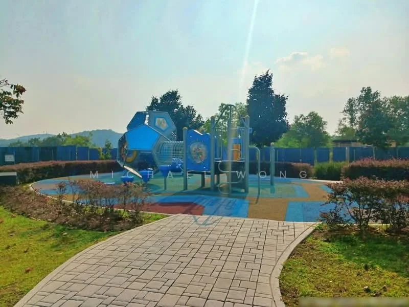 Exterior type: landscape garden; features: children's playground with climbing structure, rubberized safety flooring, paved walkway, manicured lawn, surrounding shrubs, trees in background, blue and green play equipment; style: modern.