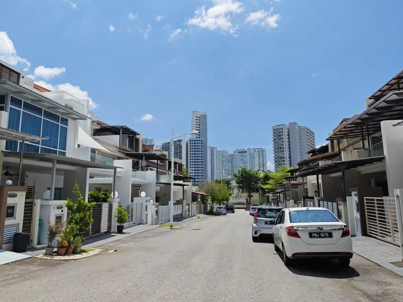 Exterior type: linked terrace house; features: two-storey linked terrace houses, white painted facade, glass balcony railings, manicured lawns, paved driveway, surrounded by greenery, urban context with high-rise buildings in background, clear blue sky; style: modern.