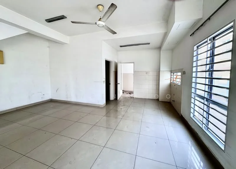 Room features: white painted walls, ceiling fan, tile flooring, window with horizontal metal grilles, light fixtures on ceiling, open layout, corner room, kitchenette area with tiled wall.