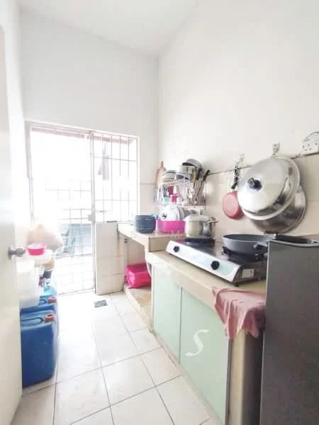 Kitchen features: white painted walls, tile flooring, single-bowl stainless-steel sink, chrome pull-down faucet, built-in gas stove, stainless-steel cooking pot, stainless-steel frying pan, plastic storage containers, kitchen countertop with cabinets, window with security bars, open doorway, pink dishcloth.