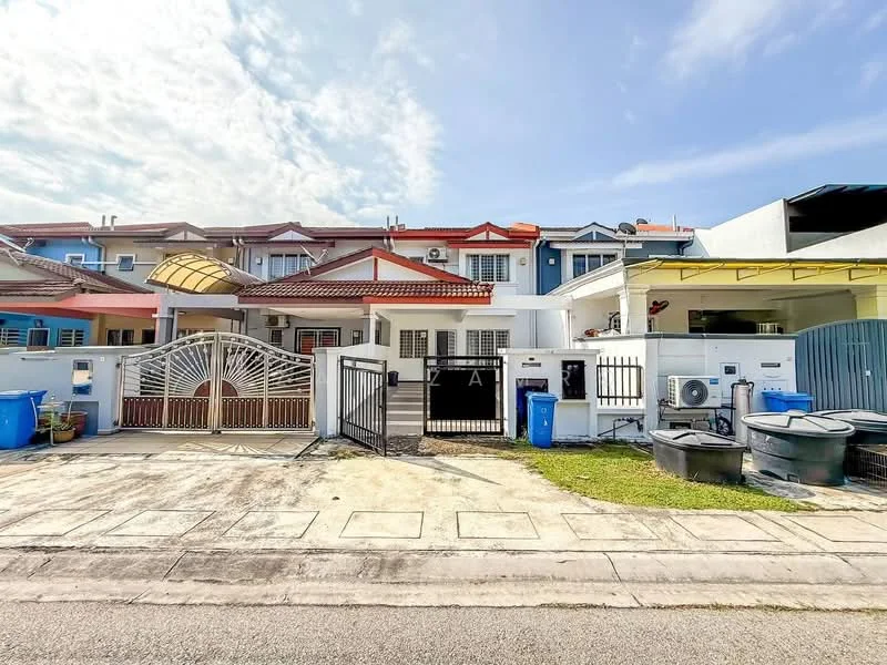 Exterior type: linked terrace house; features: white painted facade, red tiled roof, manicured lawn, paved driveway, metal gate at entrance, two blue trash bins, air conditioning units visible, covered car porch, front porch with awning, fenced perimeter; style: modern.