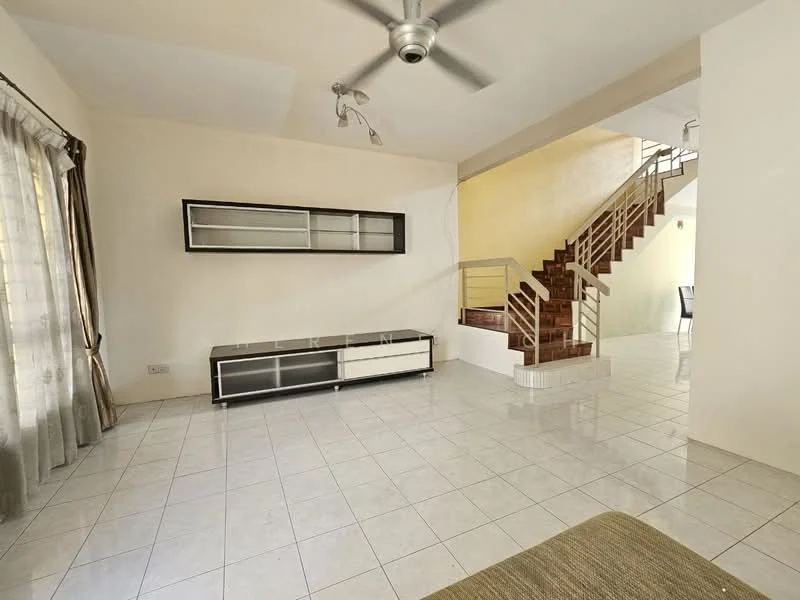 Living features: white painted walls, ceramic tile flooring, 5-blade ceiling fan, large windows with sheer curtains, built-in shelving unit in black and white, open layout to staircase, natural light from windows, neutral color scheme; style: modern.
