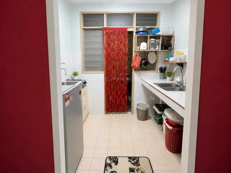 Kitchen features: single-bowl stainless-steel sink, chrome pull-down faucet, white laminate countertop, wooden cabinetry, open shelving, washing machine, red patterned curtain, tile backsplash, ceramic tile flooring, refrigerator, waste bin, plastic laundry basket, houseplants in ceramic pots, area rug with geometric pattern; style: modern.