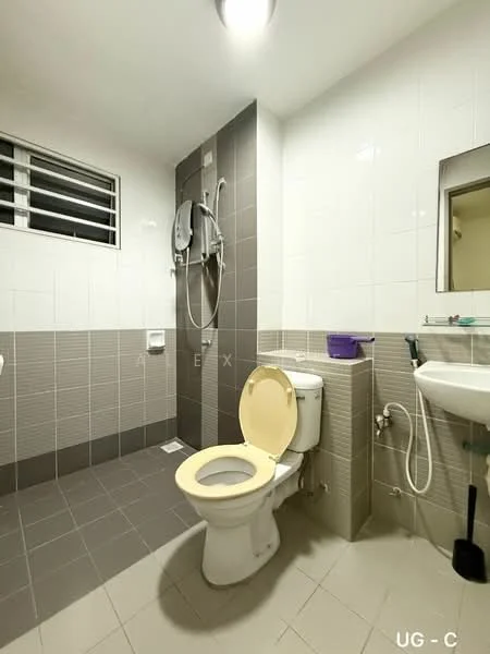 Bathroom features: white tiled walls, grey tiled flooring, one-piece toilet, golden toilet seat, shower with wall-mounted faucet, handheld shower head, mirror above sink, sink with chrome faucet, window for natural light, wall-mounted soap dispenser; style: modern.