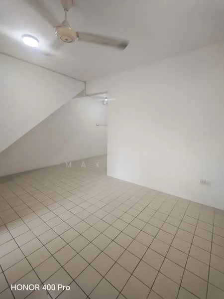Room features: white painted walls, tile flooring, ceiling fan, recessed ceiling light, staircase, corner wall with no features.