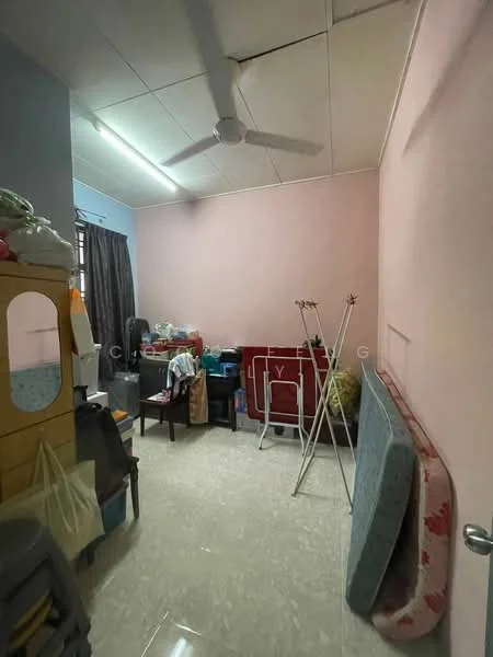 Room features: light blue painted walls, pink painted walls, ceiling fan, tiled flooring, various furniture items, clothes drying rack, mattresses, storage cabinet, curtains, boxes, laundry basket.