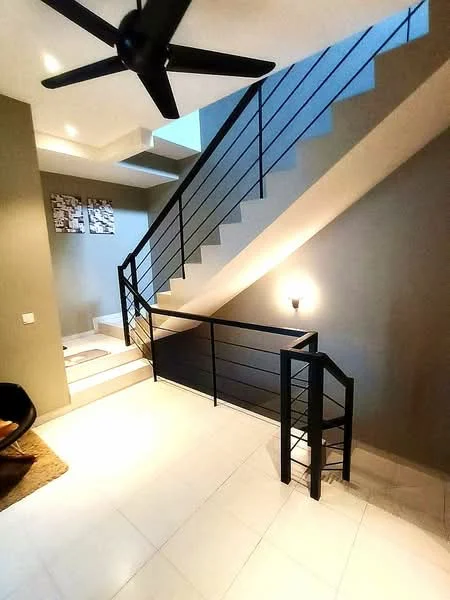Room features: staircase with black metal railing, white tiled flooring, grey painted walls, ceiling fan, recessed lighting, decorative wall art, natural light from upper level, open space layout; style: modern.