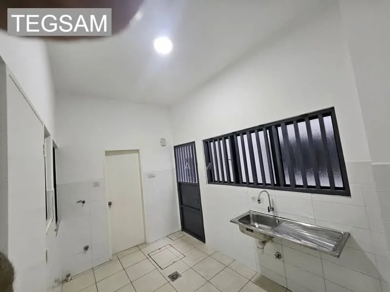 Laundry features: white painted walls, tile flooring, stainless-steel sink, metal wall-mounted shelf, window with black metal grille, door leading outside, light fixture, floor drain.