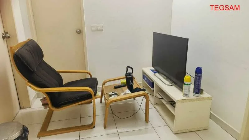 Room features: black leather armchair, wooden frame for armchair, white TV console, flat-screen TV, gaming console, water bottle, cleaning spray, air freshener, white tiled flooring, plain white walls, door to adjacent room; style: modern.