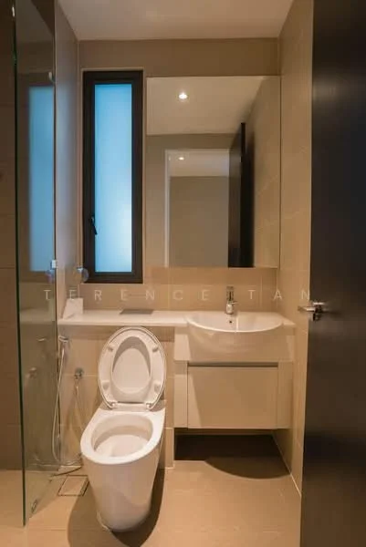 Bathroom features: single-sink vanity with white cabinet, chrome basin mixer faucet, framed mirror, one-piece toilet, walk-in shower with glass enclosure, tile cladding on walls, light beige tile flooring, recessed downlights, window for natural light; style: modern.