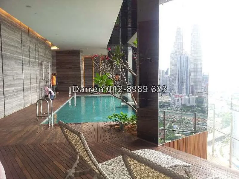 Room features: infinity pool, wooden decking, glass railing, city skyline view, potted plants, loungers, modern wall cladding, indirect lighting; style: modern; view: city.
