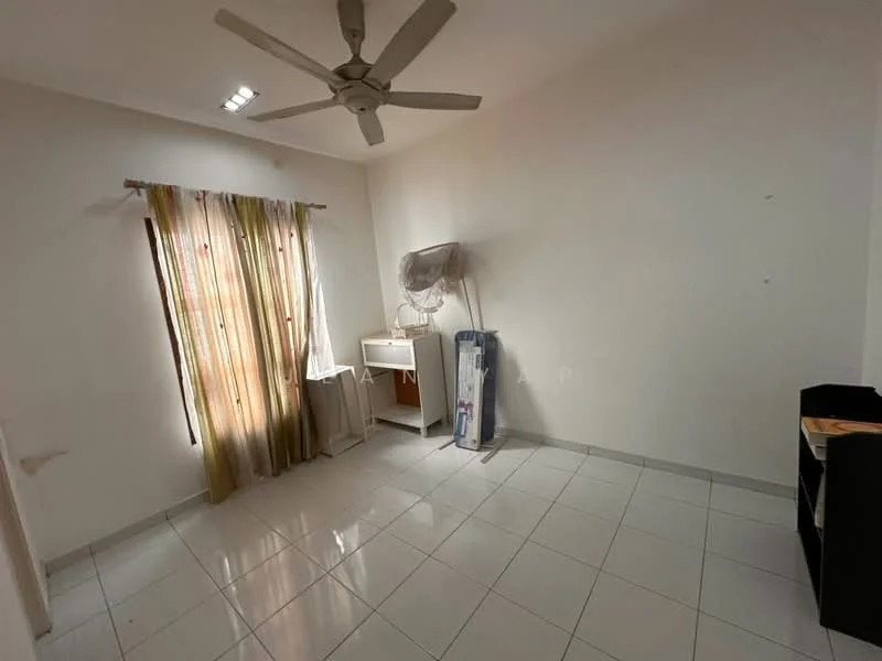 Room features: white painted walls, glossy white tile flooring, ceiling fan, floor-to-ceiling window with sheer curtains, curtains in beige and green, small white cabinet, ironing board, black storage unit.
