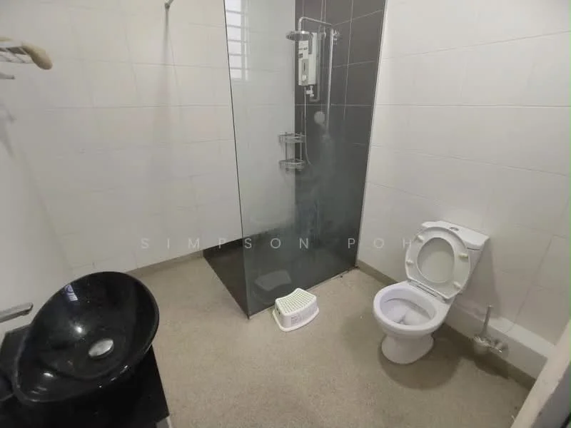 Bathroom features: glass shower enclosure, rain shower head, toilet, black ceramic sink, chrome faucet, white tiled walls, grey flooring, shower wall with black tiles, towel rack; style: modern.