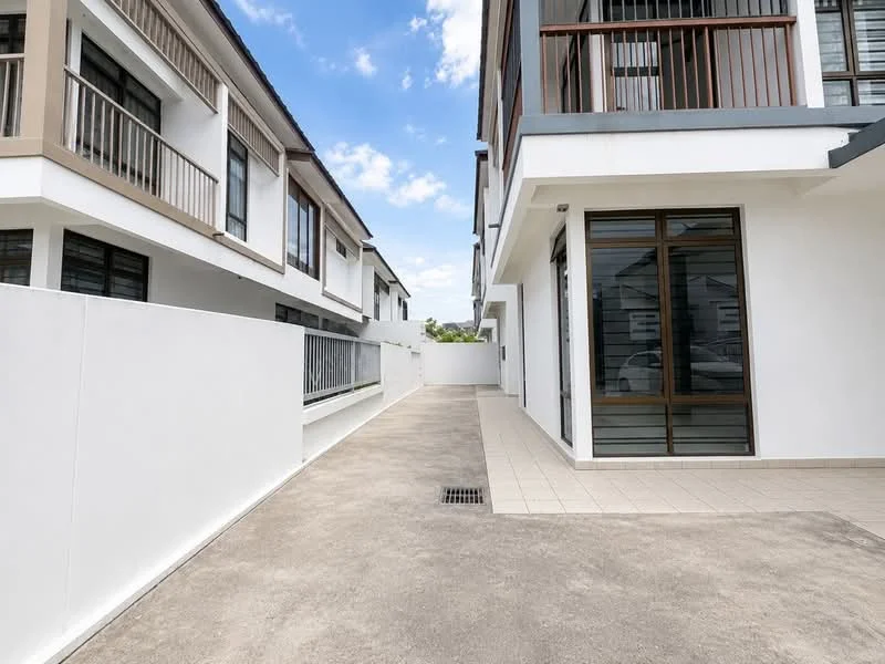 Exterior type: linked terrace house; features: white painted facade, balconies with wooden railings, concrete driveway, paved walkway, two-storey structure, large windows, modern architectural design, surrounded by greenery; style: modern.
