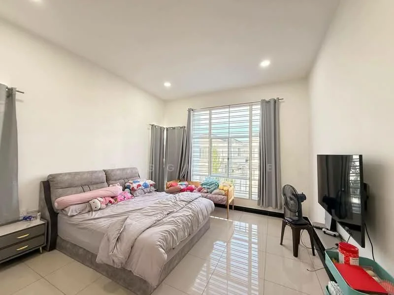 Bedroom features: king-size bed with grey upholstered headboard, bedding with colorful pillows and plush toys, floor-to-ceiling windows, grey curtains, white painted walls, glossy tile flooring, wall-mounted TV, small bedside table with drawers, chair, decorative items on the floor; style: modern.