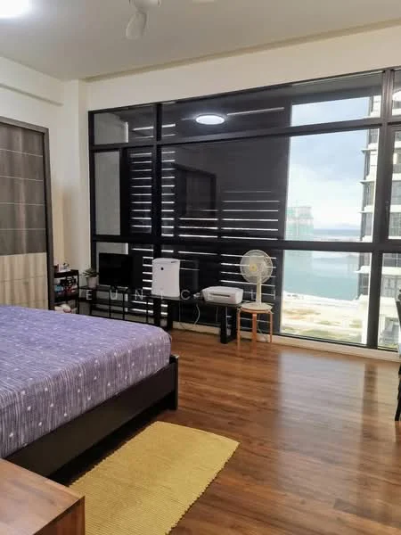 Bedroom features: king-size bed with purple bedding, wooden flooring, floor-to-ceiling windows, black window frames, sheer curtains, ceiling fan, wall-mounted TV, small refrigerator, wooden chair, area rug in yellow, decorative wall paneling; style: modern; view: sea.