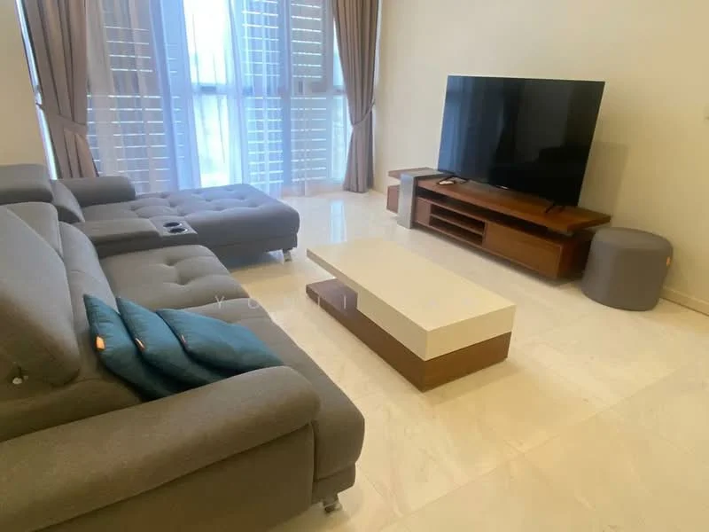 Living features: L-shape sectional sofa in grey, coffee table with white top and wooden base, TV console with wooden finish, wall-mounted TV, floor-to-ceiling windows, curtains in beige, marble tile flooring, decorative cushions in teal, light-colored walls; style: modern.
