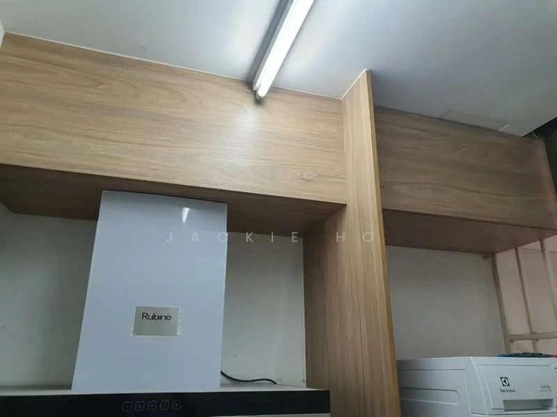 Room features: wooden cabinetry, under-cabinet lighting, white appliance, built-in storage, neutral wall, light-colored countertop; style: modern.