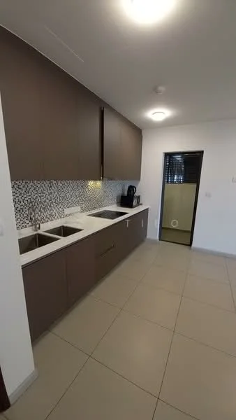 Kitchen features: brown cabinetry, white quartz countertop, double-bowl stainless-steel sink, chrome pull-down faucet, mosaic tile backsplash, built-in coffee machine, recessed downlights, tile flooring, wall-mounted cabinet, kitchen appliances, open layout; style: modern.