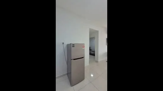 Room features: silver fridge, white walls, glossy tile flooring.