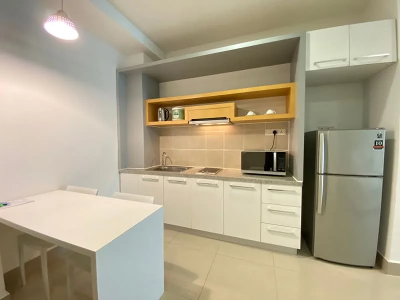 Kitchen features: white shaker cabinets, grey countertop, single-bowl stainless-steel sink, chrome pull-down faucet, built-in microwave, stainless-steel fridge, ceramic tile flooring, recessed downlights, open shelving, kitchen island, 4-burner gas hob, wall-mounted range hood; style: modern.