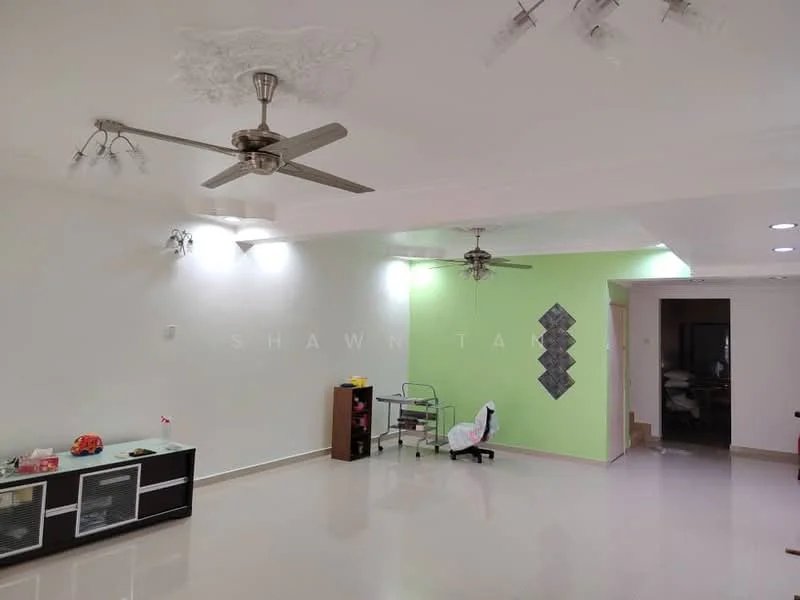 Living features: white painted walls, green accent wall, polished floor tiles, 2 ceiling fans, recessed downlights, decorative ceiling rose, open layout, TV console, small shelving unit; style: modern.