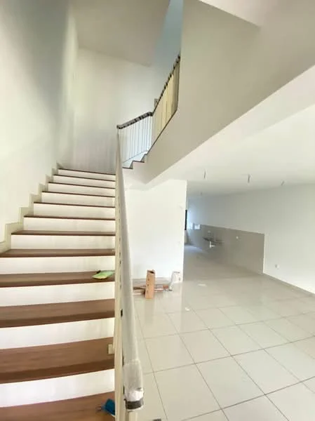 Room features: staircase with wooden steps, white painted walls, glossy white tile flooring, open space layout, ceiling with recessed lighting, large windows for natural light, minimalist design, handrail along staircase; style: modern.