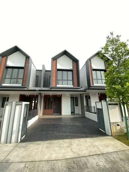 Exterior type: linked terrace house; features: two-storey building, grey painted facade, red brick accents, flat roof, large windows with black frames, front porch with concrete flooring, manicured landscaping with small trees, fenced front yard, driveway with interlocking pavers; style: modern.