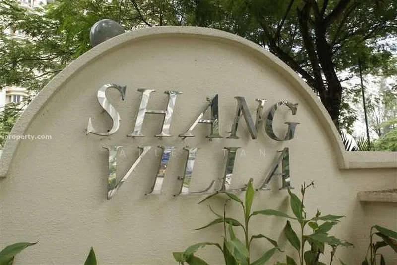 Exterior features: signage with reflective letters, landscaped greenery, surrounding trees, stone wall, outdoor lighting, well-maintained garden area; style: modern.
