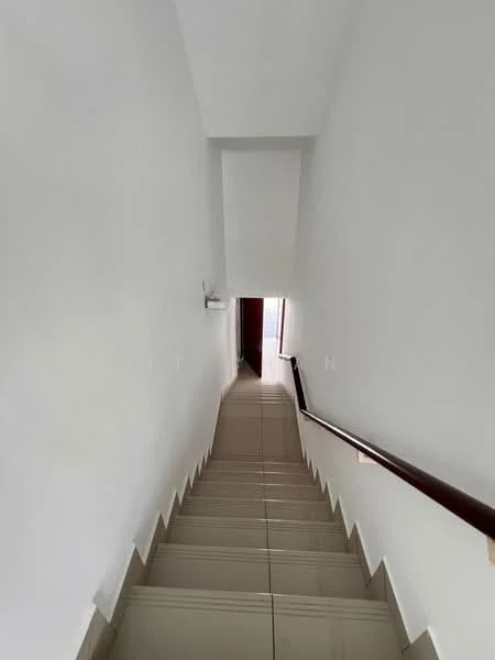 Room features: white painted walls, tile flooring, wooden handrail, staircase with risers, natural light from upper level, doorway at the bottom of the stairs.