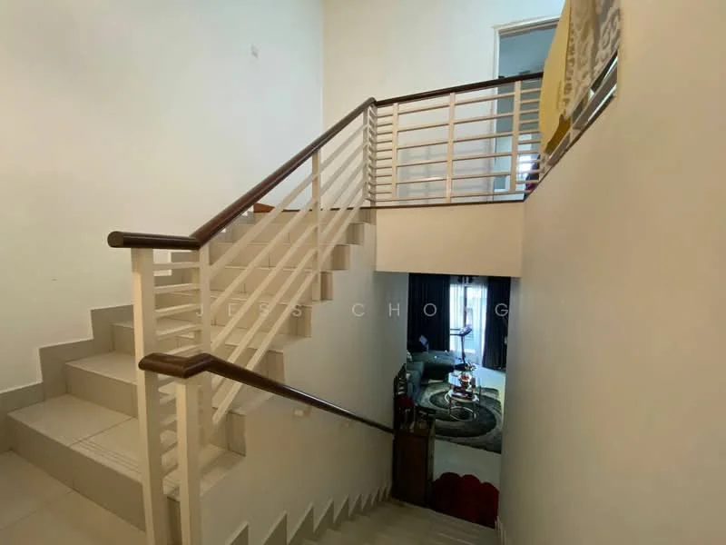Room features: staircase with white risers, light grey tiled flooring, wooden handrail, white painted walls, open space, natural light from upper level, decorative rug at the bottom of the stairs, dark furniture visible in the background; style: modern.