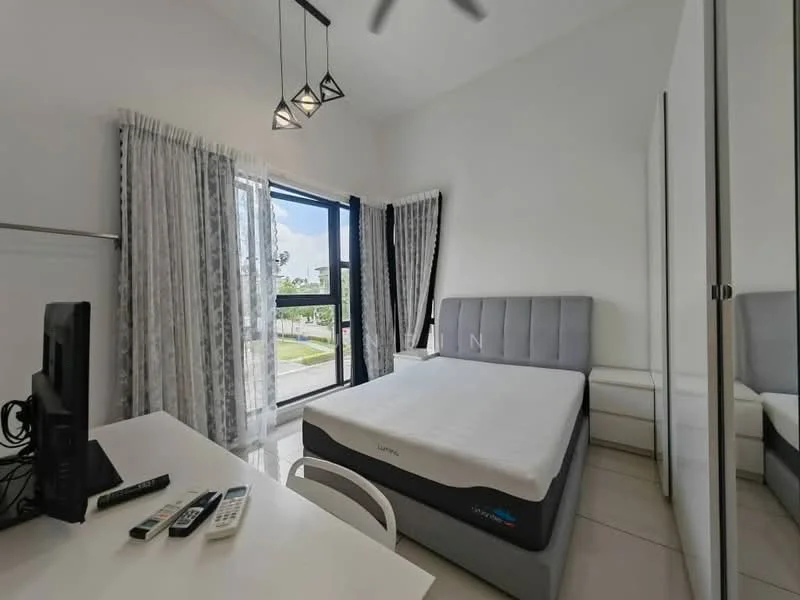 Bedroom features: queen-size bed with grey upholstered headboard, white bedding, floor-to-ceiling windows, sheer curtains, grey accent wall, white painted walls, white tile flooring, ceiling fan with light, built-in wardrobe with mirrored doors, desk with white chair, TV on desk, remote controls on desk; style: modern; view: garden.